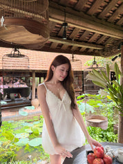 Angelique Lace-Trimmed Bow Slip dress